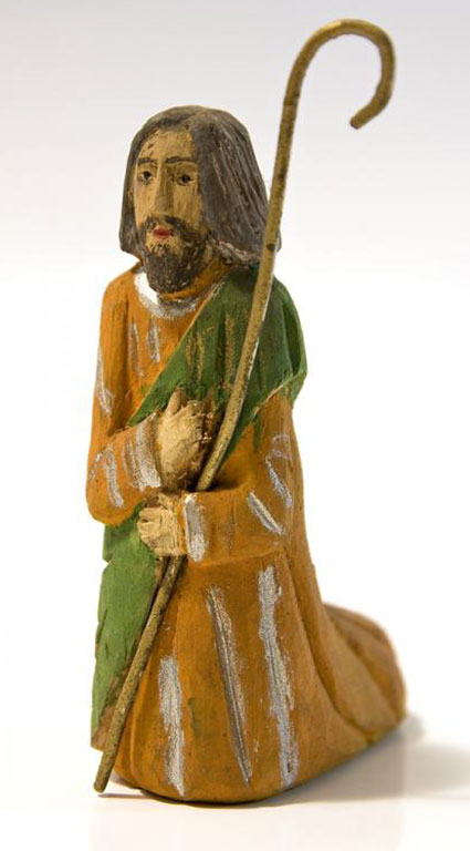 Rzeźba drewniana, święty Józef klęczący, trzymający laskę.